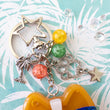 Load image into Gallery viewer, Sunset Strip Corgi with Blue Shades Liquid Shaker Charm