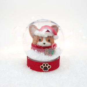 Red Santa Corgi with Gingerbread Man and Candy Cane Snow Globe